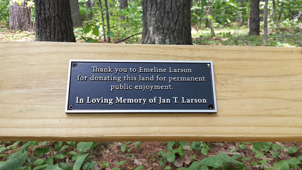 Plaque on bench in memory of Jan T. Larson